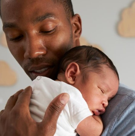 Father holding baby