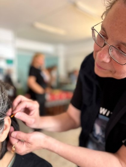 acupuncturist needling ear