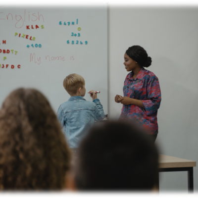 Teacher and child at the chalkboard